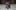 A black notepad with orange and white text reading: Something wicked this way comes.